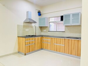 Kitchen in 3 BHK Apartment at Gera Song Of Joy, Kharadi – for Sale