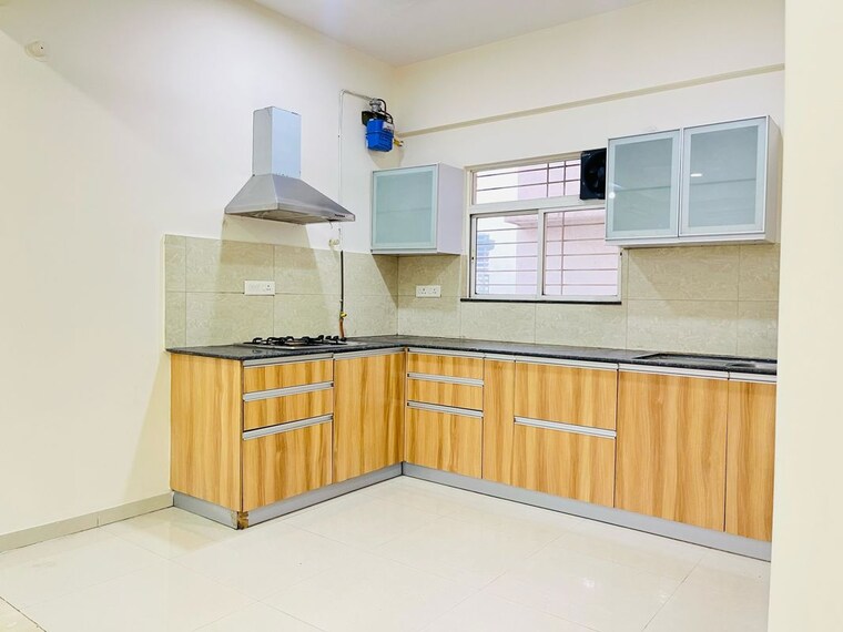 Kitchen, gera-song-of-joy 3 Bedroom 1625 Sq.Ft. Apartment In Kharadi Pune 10598048