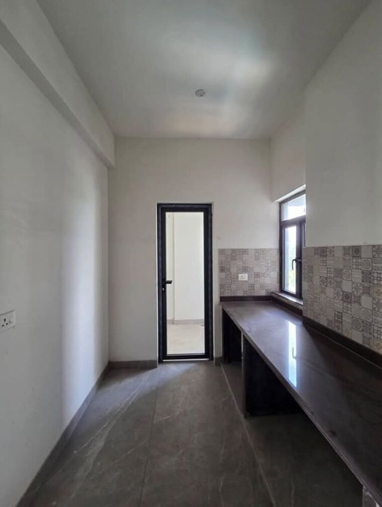 Kitchen, dlf-new-town-heights 3 Bedroom 1460 Sq.Ft. Apartment In Rajarhat New Town Kolkata 10598142