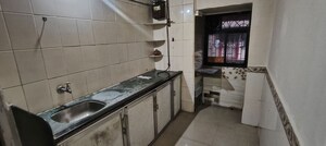 Kitchen in 2 BHK Apartment at Vrindavan CHS Vashi, Sanpada – for Rent