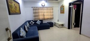 Living Room in 1.5 BHK Apartment at Pramukh Palace, Borivali West – for Rent