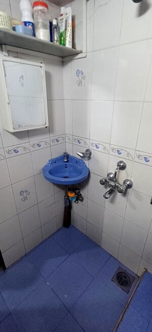 Bathroom in 1.5 BHK Apartment at Pramukh Palace, Borivali West – for Rent