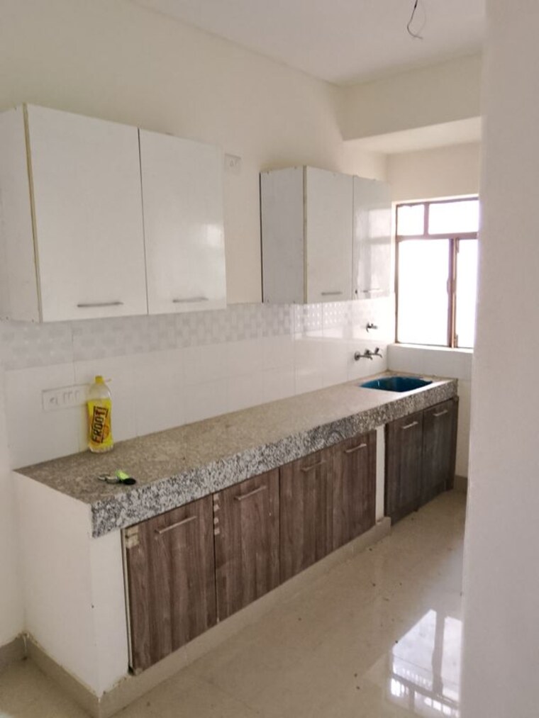 Kitchen, pareena-laxmi-apartments 2 Bedroom 620 Sq.Ft. Apartment In Sector 99 Gurgaon 10598191