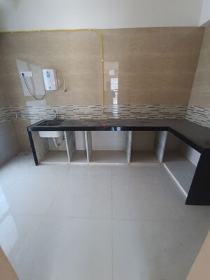 Kitchen in 3 BHK Apartment at Raj Infinia, Malad West – for Rent