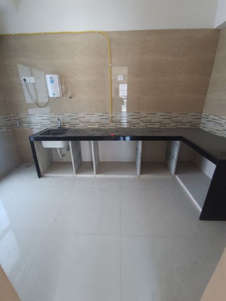 Kitchen, raj-infinia 3 Bedroom 1700 Sq.Ft. Apartment In Malad West Mumbai 10359045