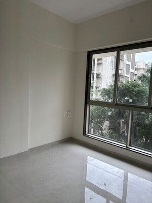 Room in 2 BHK Apartment at Kiran Towers, Malad West – for Rent