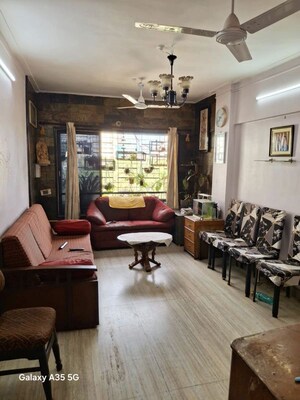 Living Room in 2 BHK Apartment at Kiran Towers, Malad West – for Rent