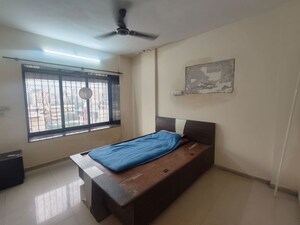Bedroom in 2 BHK Apartment at Royal Pleasant Park CHS, Malad West – for Rent