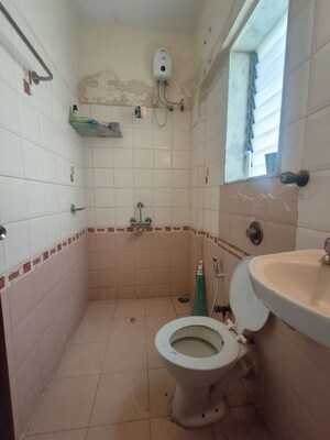 Bathroom in 2 BHK Apartment at Royal Pleasant Park CHS, Malad West – for Rent