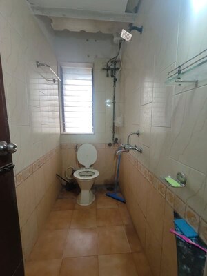 Bathroom in 2 BHK Apartment at Royal Pleasant Park CHS, Malad West – for Rent