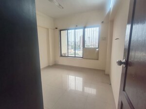 Bedroom in 2 BHK Apartment at Royal Pleasant Park CHS, Malad West – for Rent