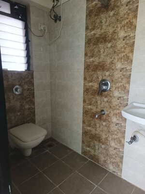 Bathroom in 3 BHK Apartment at Manisha CHS Mulund, Mulund East – for Sale