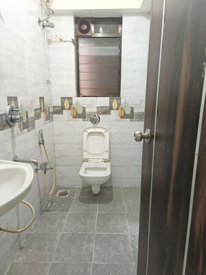 Bathroom in 3 BHK Apartment at Manisha CHS Mulund, Mulund East – for Sale