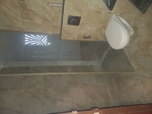 Bathroom in 4 BHK Apartment at Mahagun Mezzaria, Sector 78 – for Rent
