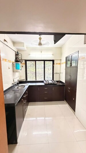 Kitchen in 2 BHK Apartment at Happy Valley, Manpada – for Rent