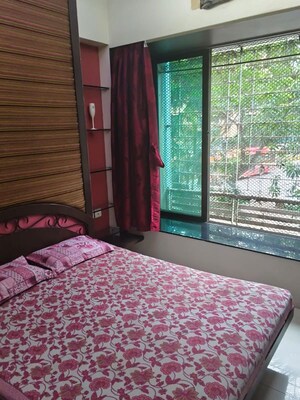 Bedroom in 2 BHK Apartment at Arkade Bhoomi Heights, Kandivali West – for Sale