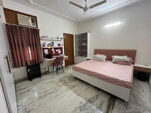 Bedroom in 3 BHK Builder Floor at Sarvodaya Enclave – for Sale