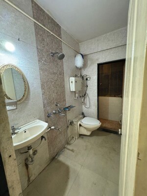Bathroom in 2 BHK Apartment at Swastik Regalia, Waghbil – for Rent