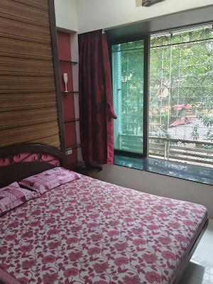Bedroom in 2 BHK Apartment at Arkade Bhoomi Heights, Kandivali West – for Rent