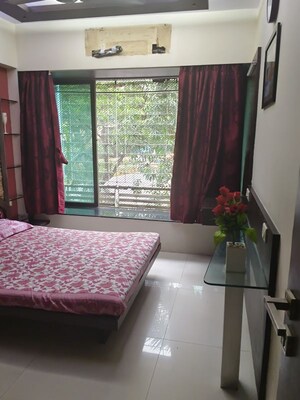 Bedroom in 2 BHK Apartment at Arkade Bhoomi Heights, Kandivali West – for Rent