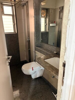 Bathroom in 2 BHK Apartment at Kalpataru Hills, Manpada – for Rent