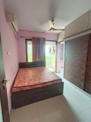 Bedroom in 2 BHK Apartment at Shanti Green Palms, Ghansoli – for Rent