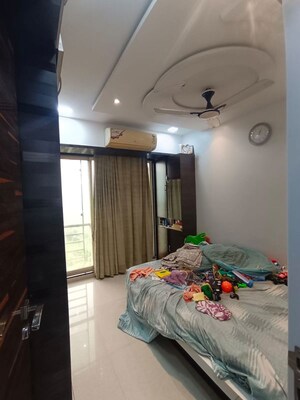 Bedroom in 2 BHK Apartment at Shanti Green Palms, Ghansoli – for Rent