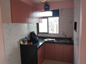 Kitchen in 1 BHK Apartment at Chandak Nishchay Wing F, Borivali East – for Rent