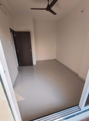 Bedroom in 1 BHK Apartment at Patkar Ram Empire, Kulgaon – for Sale