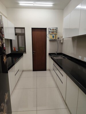 Kitchen in 2.5 BHK Apartment at Bhugaon – for Rent