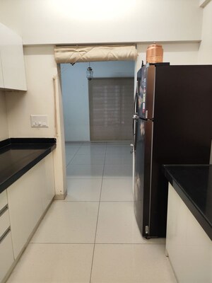 Kitchen in 2.5 BHK Apartment at Bhugaon – for Rent
