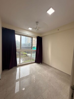 Living Room in 1 BHK Apartment at Lodha Crown Quality Homes, Majiwada – for Rent