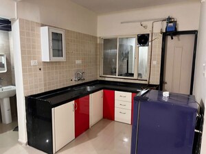 Kitchen in 2 BHK Apartment at SSD Sai Platinum, Pimple Saudagar – for Rent