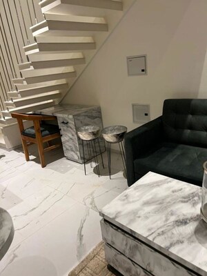 Team Area in Studio Apartment at M3M Sky Lofts, Sector 71 – for Rent