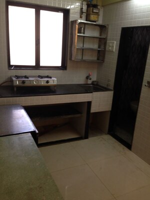 Kitchen in 1 BHK Apartment at Jai Ambika CHS, Mulund West – for Rent