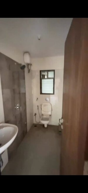 Bathroom in 2 BHK Apartment at Kosmos Nandanvan, Borivali West – for Sale