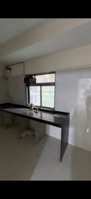 Kitchen in 2 BHK Apartment at Kosmos Nandanvan, Borivali West – for Sale
