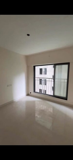 Bedroom in 2 BHK Apartment at Kosmos Nandanvan, Borivali West – for Sale