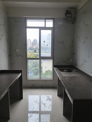 Kitchen in 3 BHK Apartment at Kosmos Express Tower CHS, Borivali West – for Sale