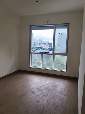 Room in 3 BHK Apartment at Kosmos Express Tower CHS, Borivali West – for Sale