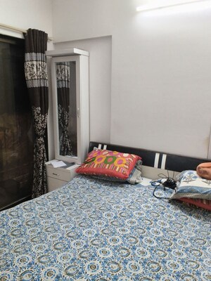 Bedroom in 2 BHK Apartment at Mahasiddivinayak CHS, Borivali West – for Sale