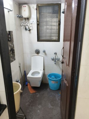 Bathroom in 2 BHK Apartment at Mahasiddivinayak CHS, Borivali West – for Sale