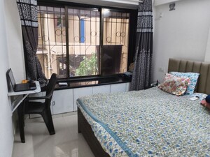 Bedroom in 2 BHK Apartment at Mahasiddivinayak CHS, Borivali West – for Sale