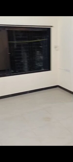 Room in 1 BHK Apartment at Ahimsa Niketan CHS, Malad West – for Rent