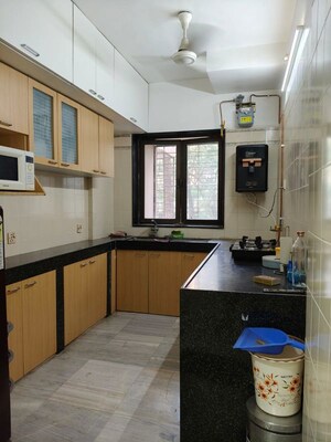 Kitchen in 2 BHK Apartment at Shiv Shrishti CHS, Powai – for Rent