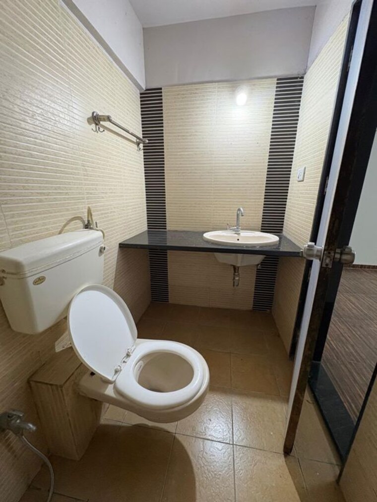 Bathroom, gini-bellissimo 3 Bedroom 1200 Sq.Ft. Apartment In Dhanori Pune 10599004