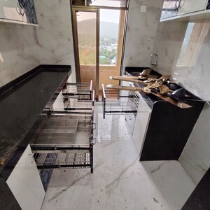 Kitchen in 1 BHK Apartment at Raunak Bliss, Ghodbunder Road – for Rent