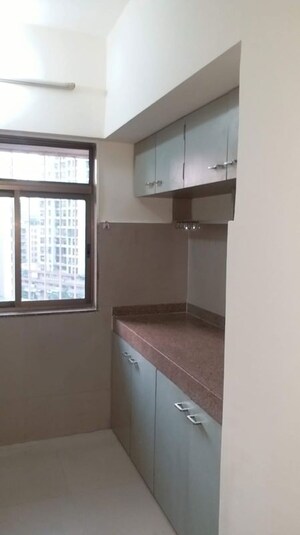 Kitchen in 1 BHK Apartment at Ram Pushpanjali Residency, Owale – for Rent
