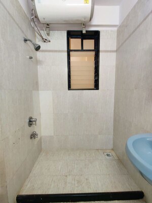 Bathroom in 3 BHK Apartment at Abrol Vastu Park, Malad West – for Rent