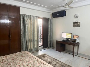Bedroom in 3 BHK Builder Floor at Chittaranjan Park – for Sale